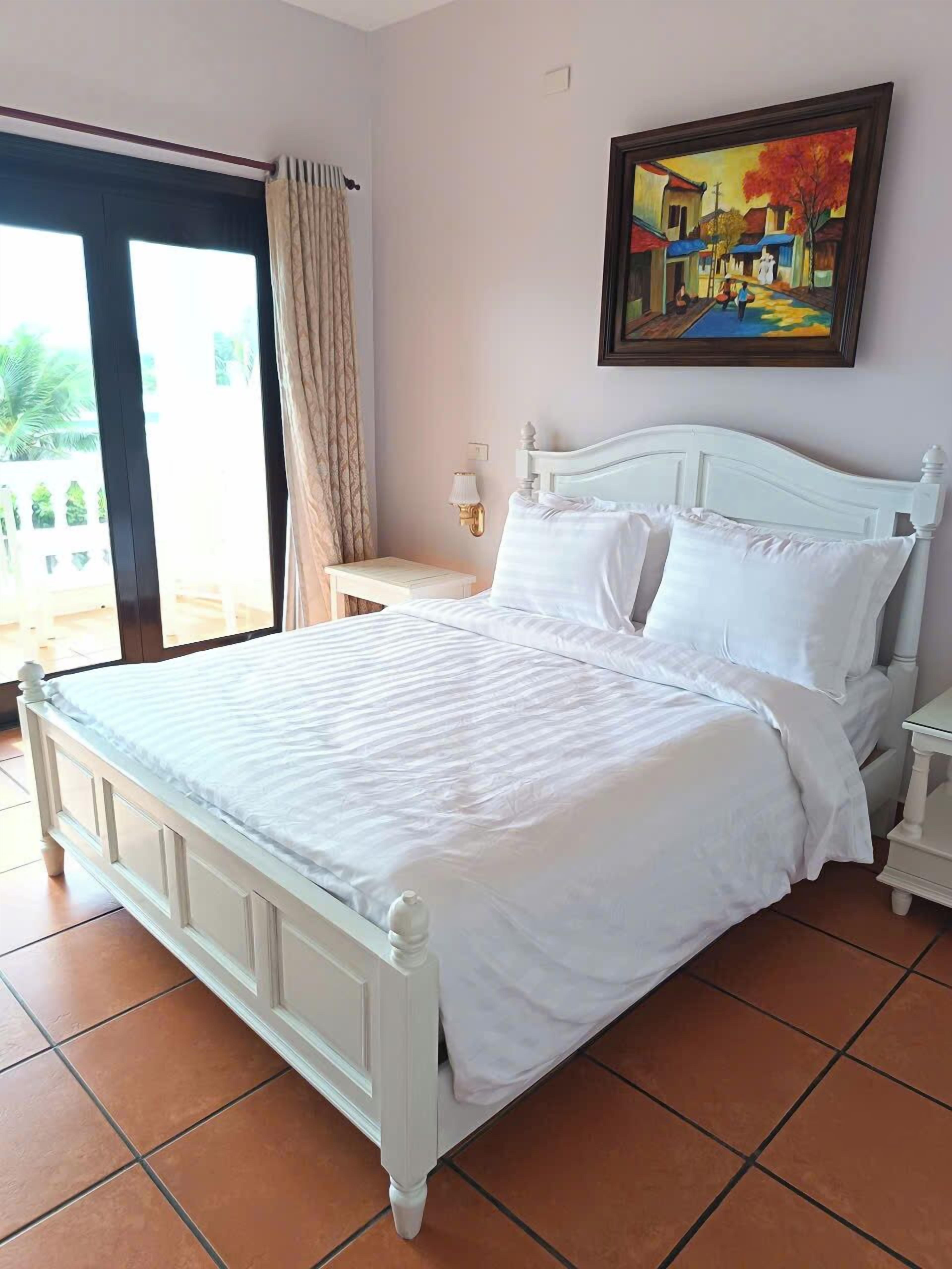 Kamar Deluks, 1 Tempat Tidur King, pemandangan laut terbatas (Sea View Premium) | 1 kamar tidur, seprai premium, bantalan ekstra lembut, dan minibar