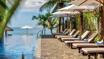 Outdoor pool, open 6:00 AM to 7:00 PM, sun loungers