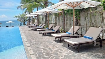 Outdoor pool, open 6:00 AM to 7:00 PM, sun loungers