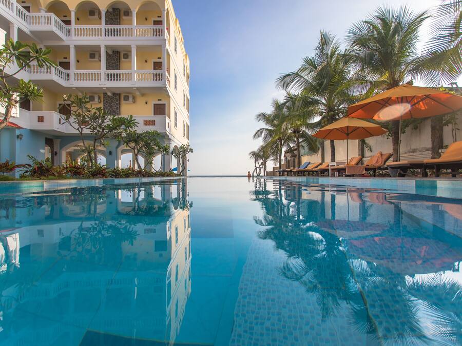 Outdoor pool, open 6:00 AM to 7:00 PM, sun loungers