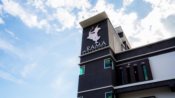 A modern building with a sign that reads "RAMA RESIDENCE" and a logo above it. - The Rama Residence Chiang Rai (Chiang Rai)