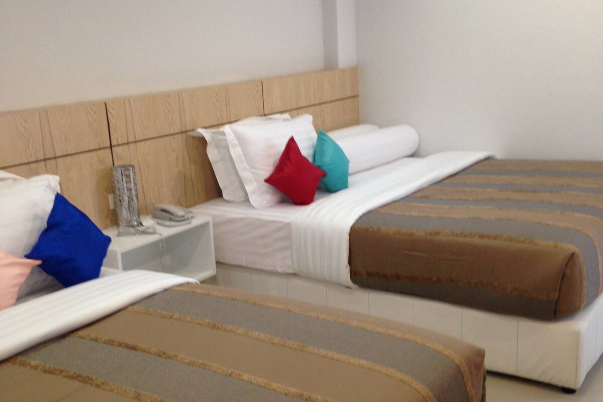 family room | 1 bedroom, minibar, desk, blackout curtains