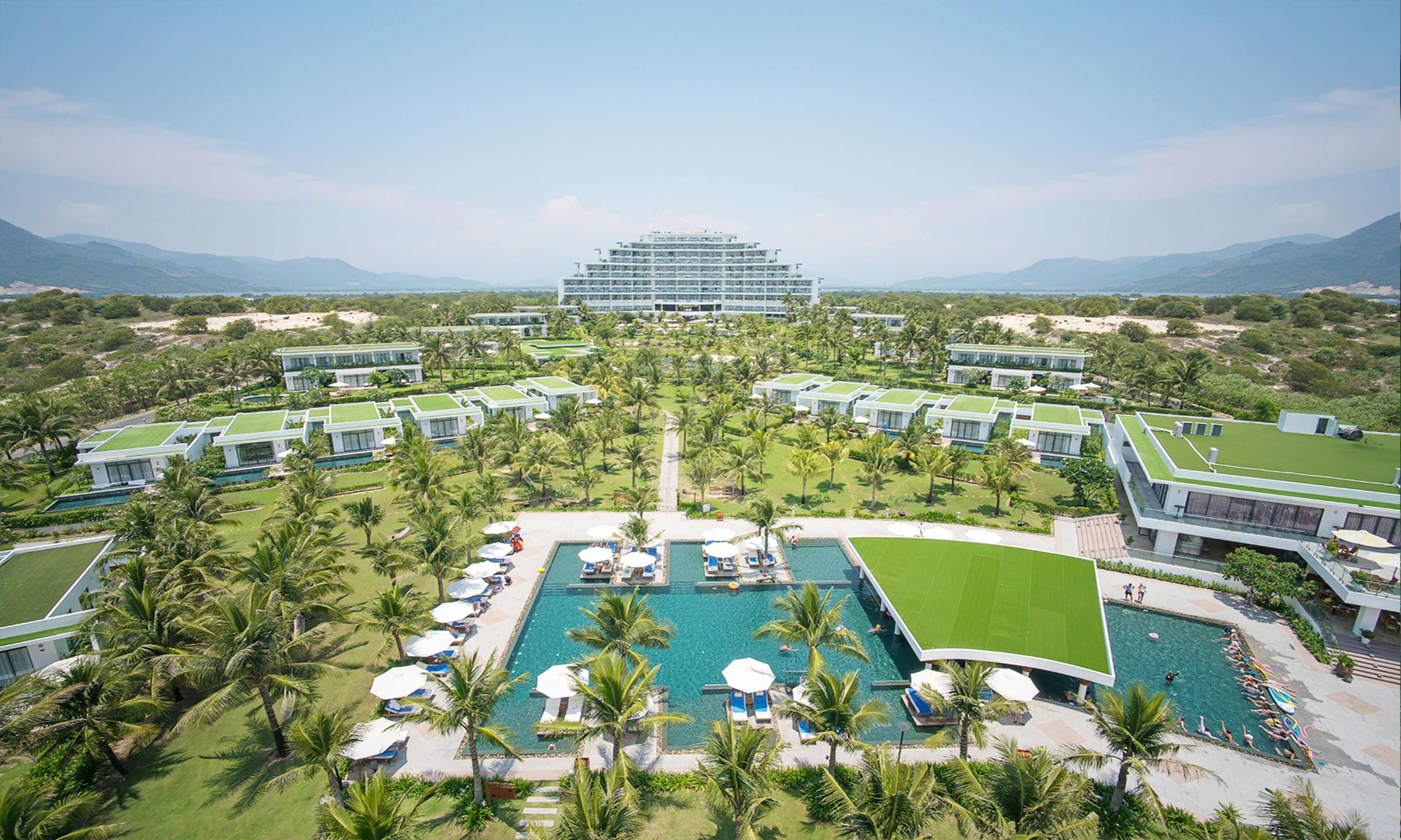 2 outdoor pools, open 6:00 AM to 6:00 PM, pool umbrellas
