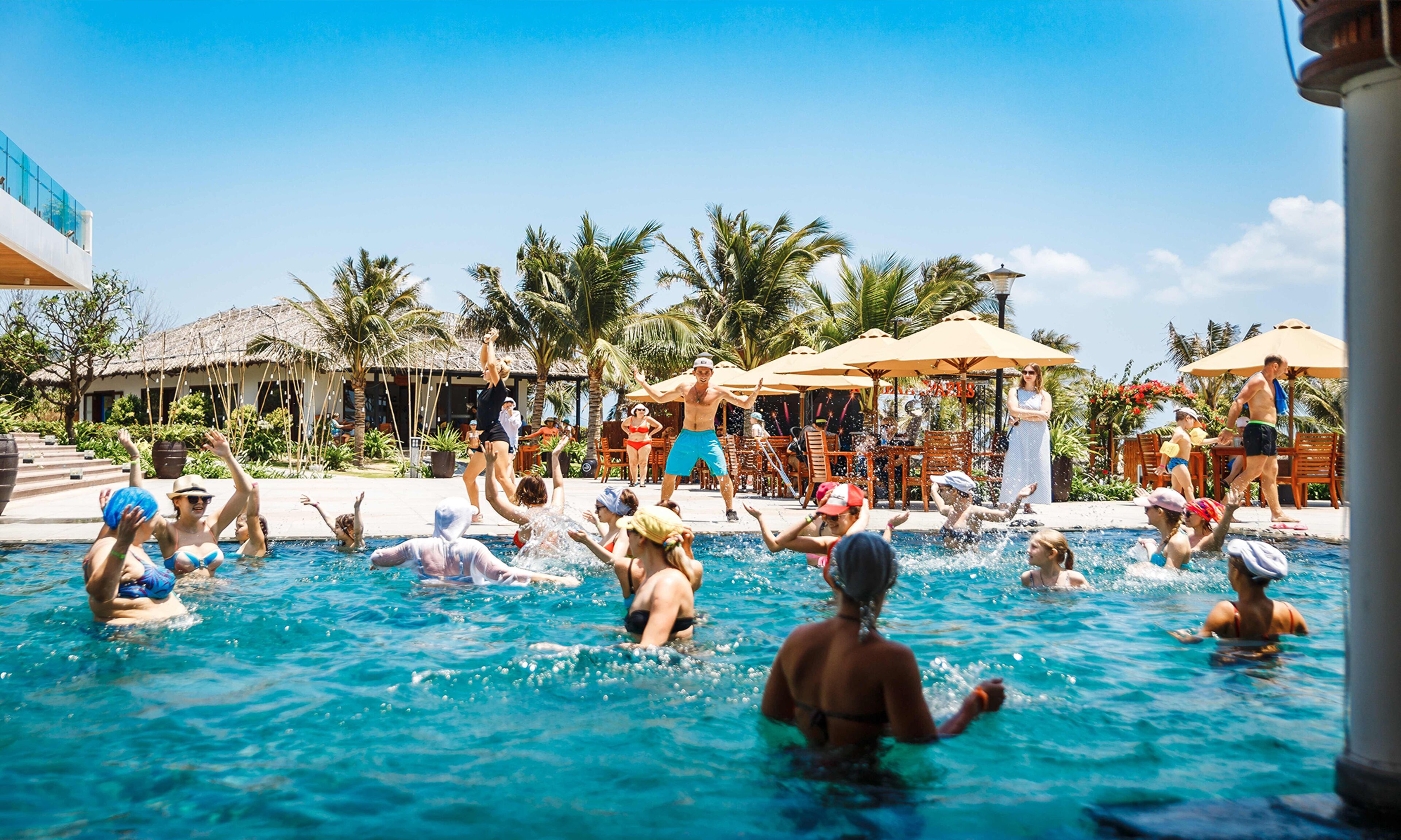 2 outdoor pools, open 6:00 AM to 6:00 PM, pool umbrellas