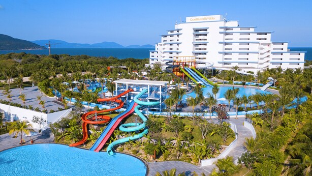 A resort with a large pool, water slides, and a hotel named "Camaranh Riviera". - Cam Ranh Riviera Beach Resort & Spa (Cam Lam)