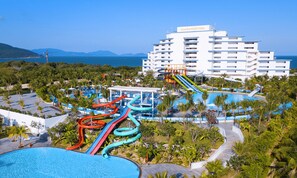A resort with a large pool, water slides, and a hotel named "Camaranh Riviera". - Riviera Beach Resort & Spa (Cam Lam)