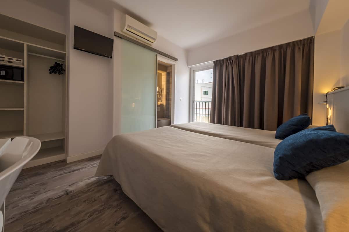 Quarto casal de uso individual | Frigobar, cofres nos quartos, cortinas blackout, Wi-Fi de cortesia