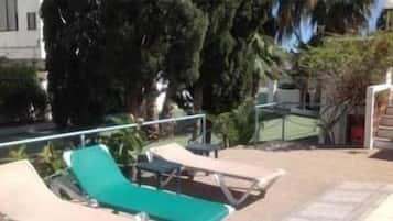 Outdoor pool, open 9:00 AM to 9:00 PM, pool umbrellas, sun loungers