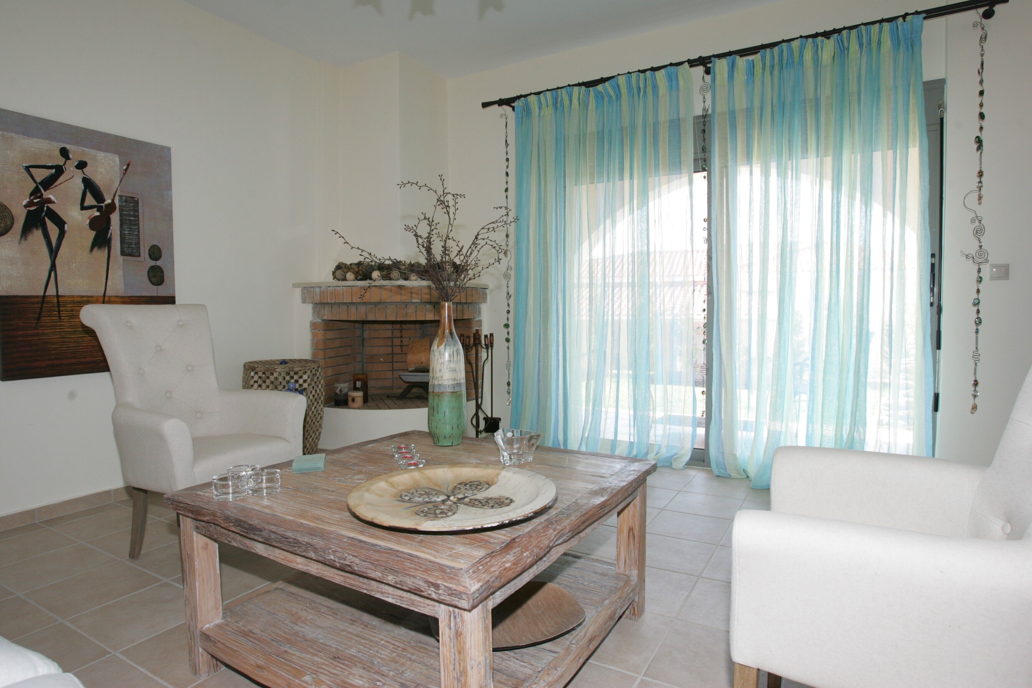 Villa, Terrace, Sea View | Living room | Flat-screen TV, fireplace