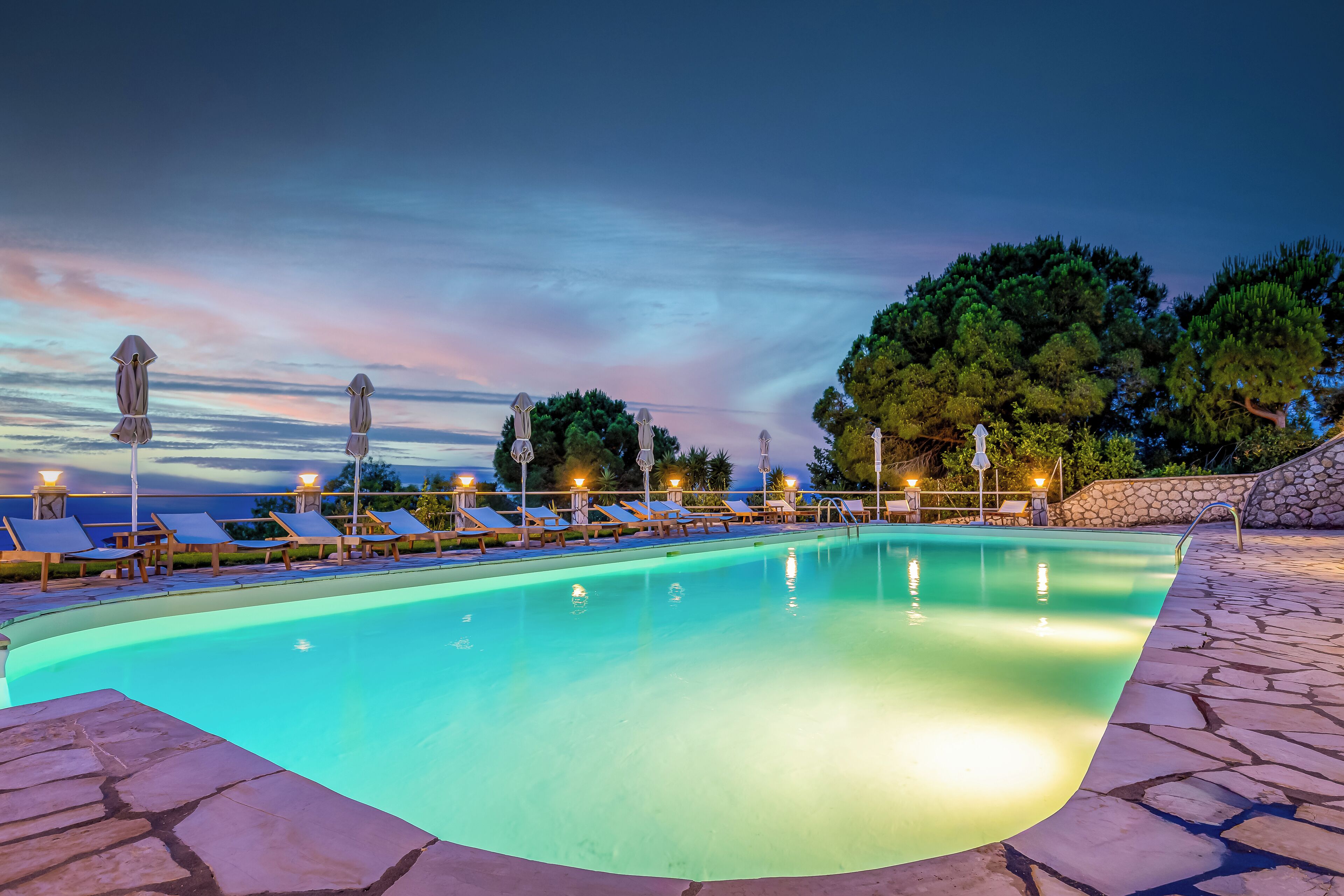 seasonal outdoor pool, pool umbrellas, pool loungers