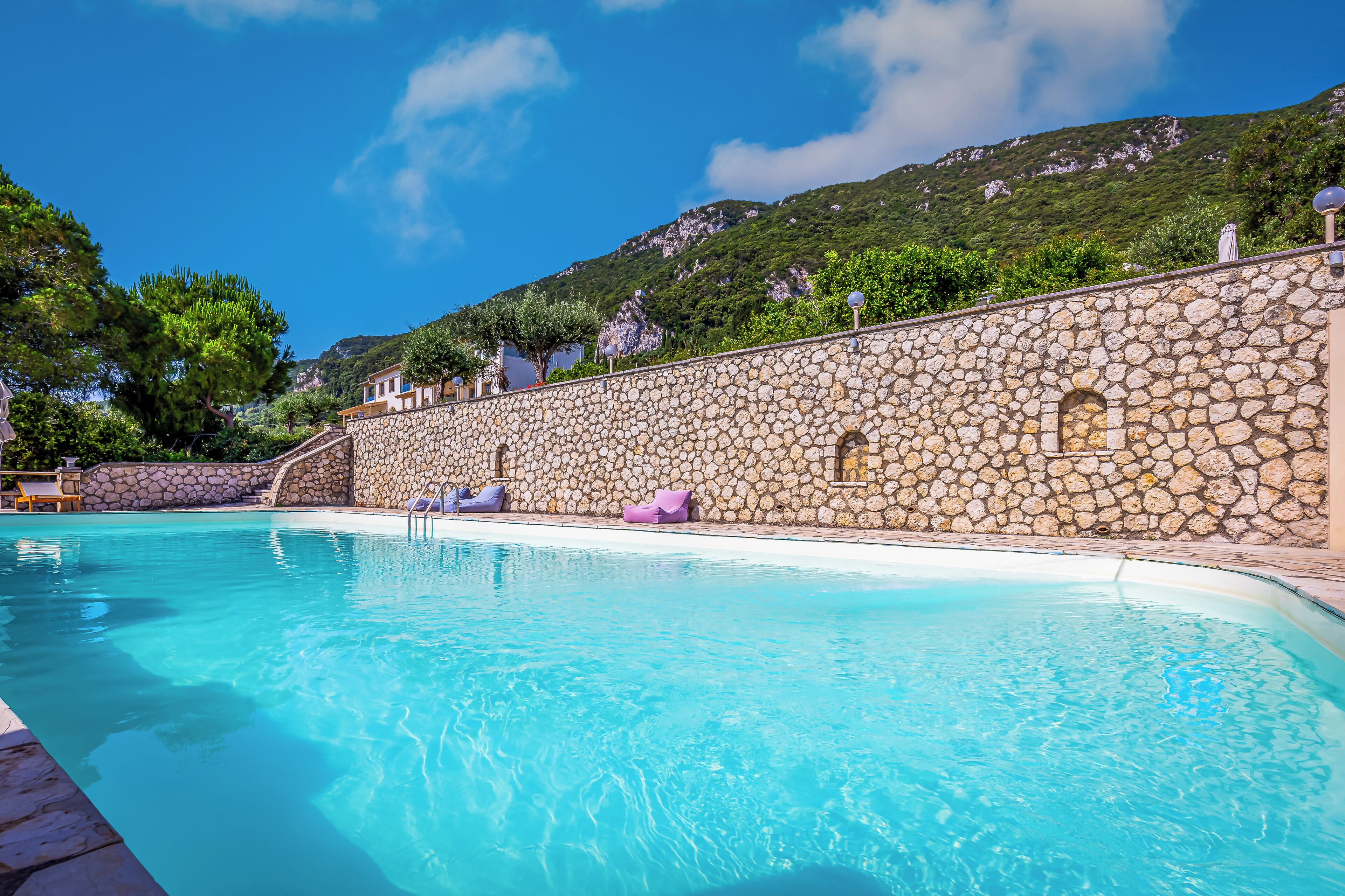 seasonal outdoor pool, pool umbrellas, pool loungers