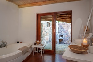 Deep soaking tub, free toiletries, hair dryer, bathrobes