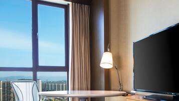 Premium bedding, down comforters, in-room safe, desk