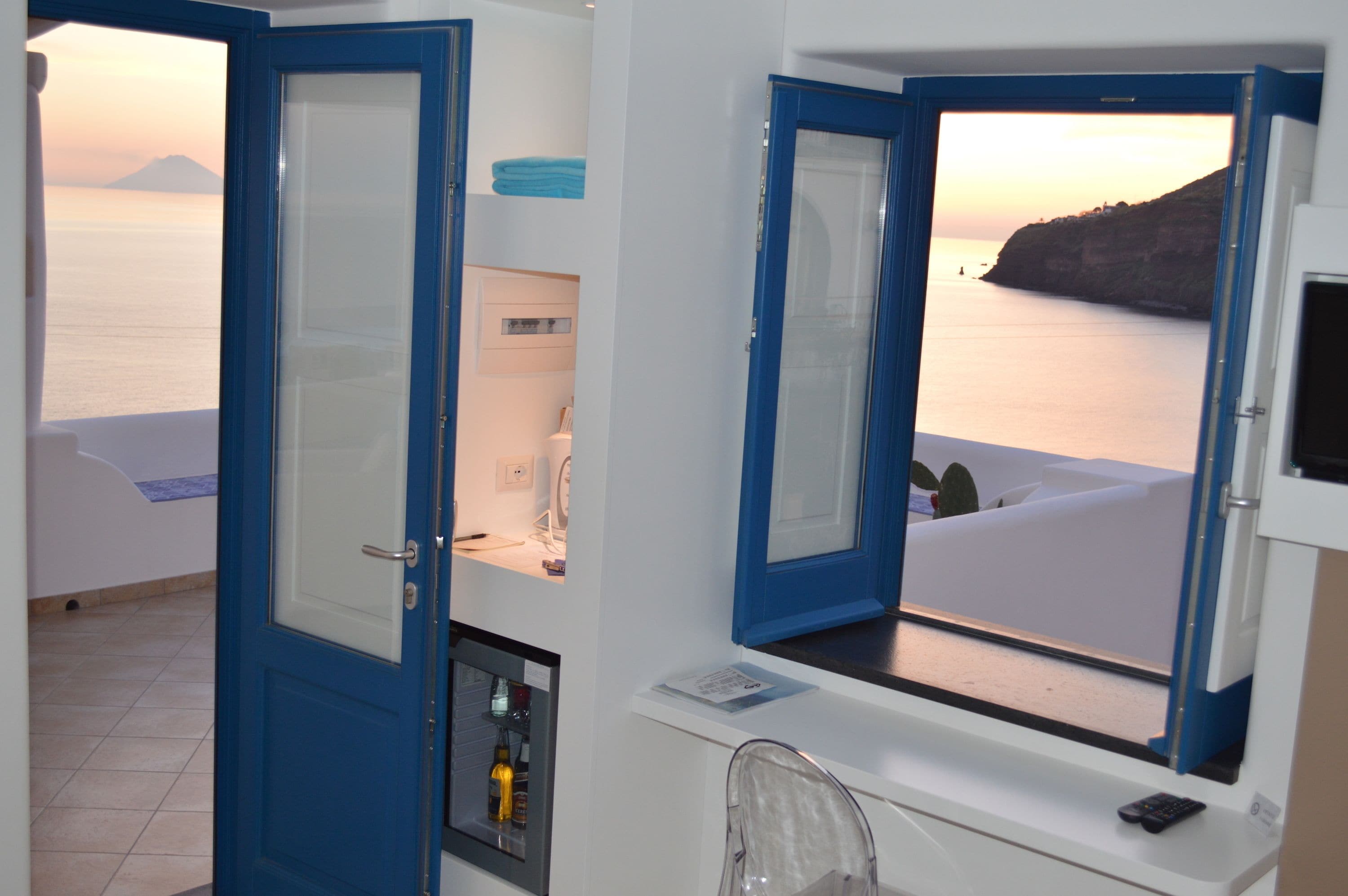 Deluxe Double Room, Balcony, Sea View | Minibar, in-room safe, desk, free WiFi