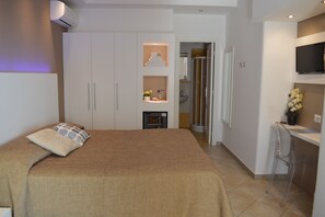 Quarto standard, terraço | Frigobar, cofres nos quartos, escrivaninha, Wi-Fi de cortesia