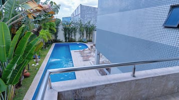 Suite Luxo com Varanda | Area keluarga
