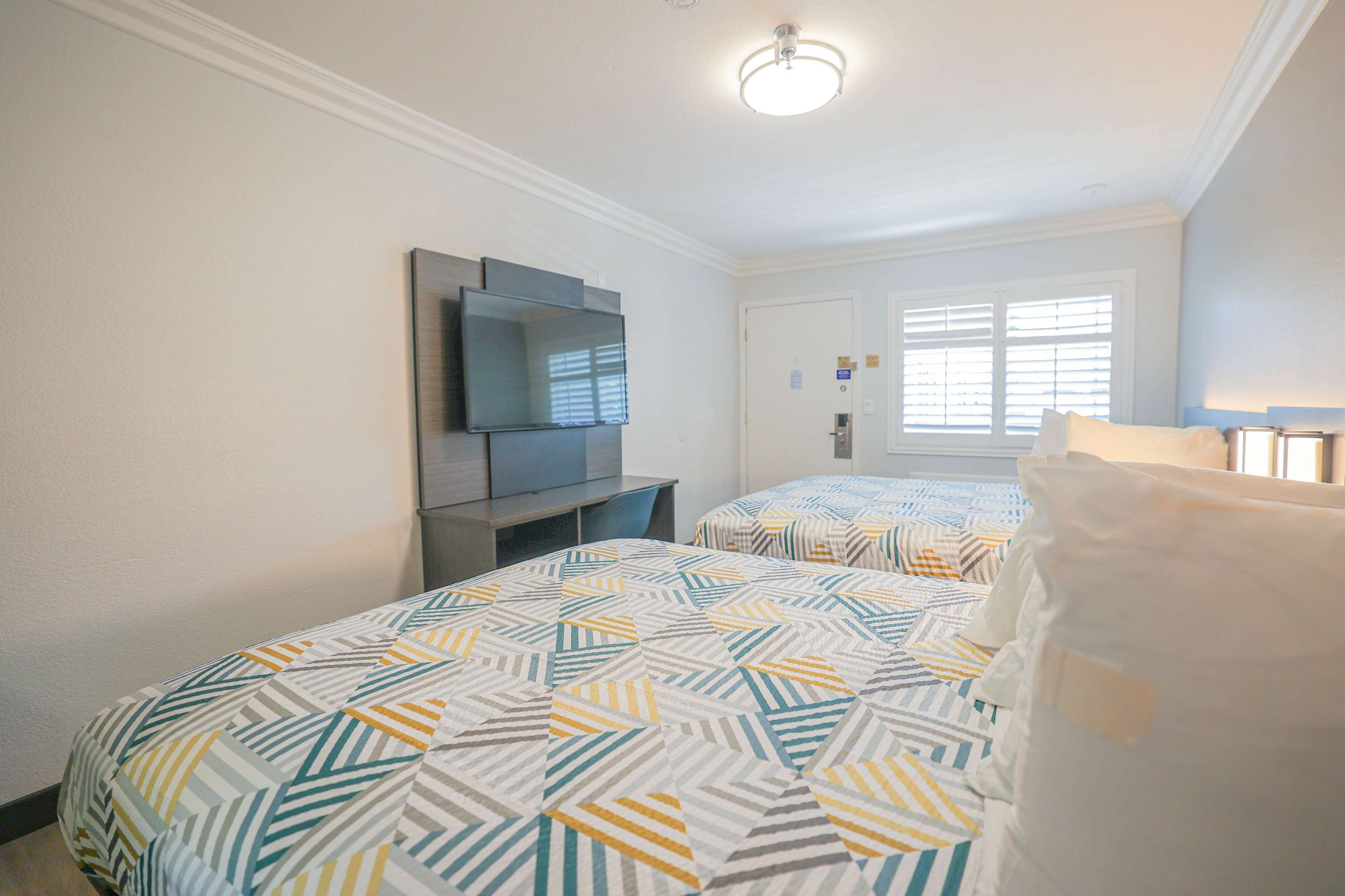 Desk, blackout curtains, free WiFi, bed sheets