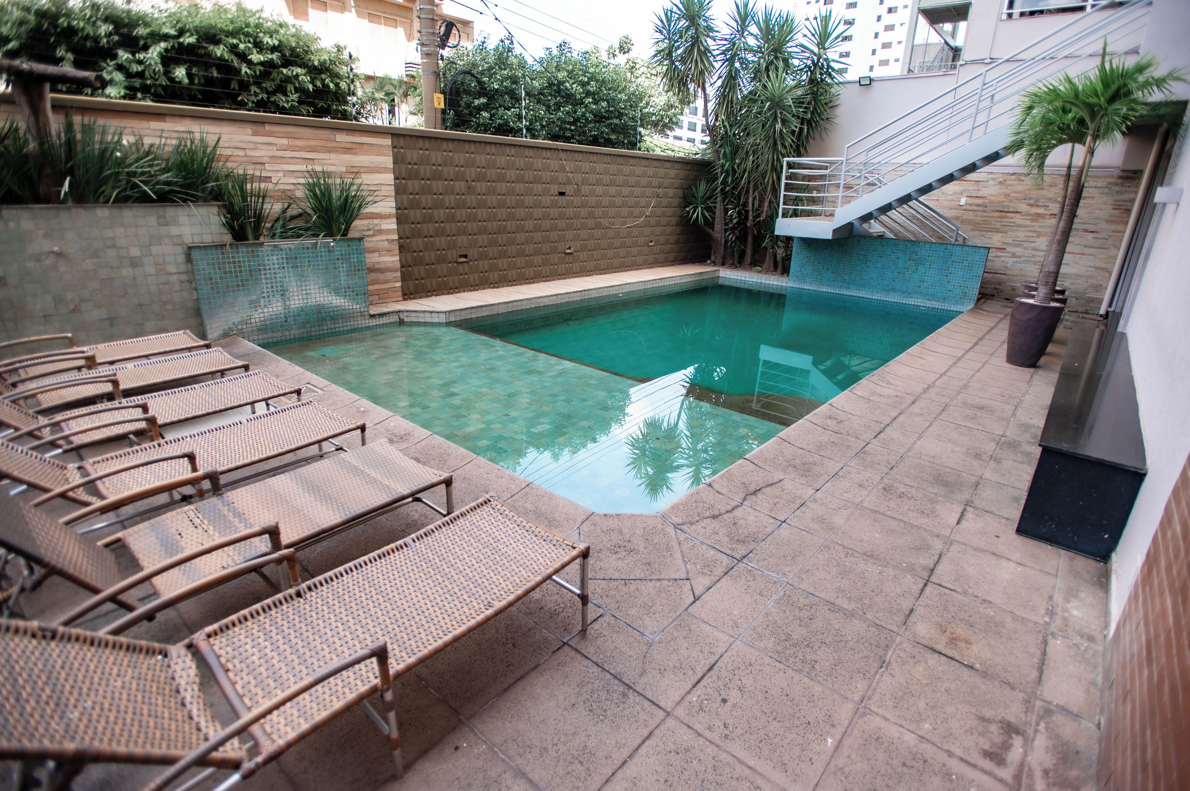 outdoor pool, open 6:00 am to 10:00 pm, pool loungers