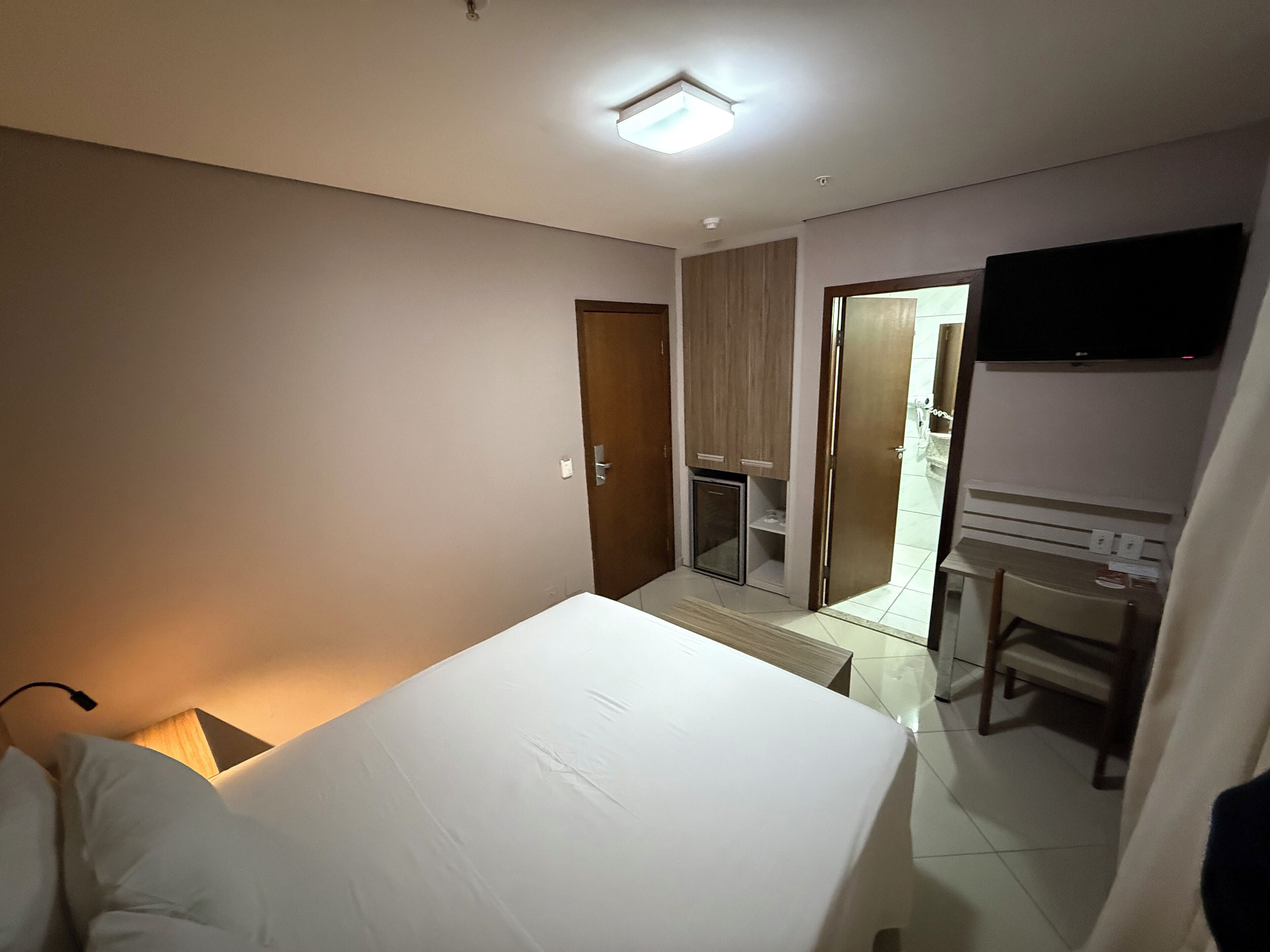 economy double room, 1 double bed | 1 bedroom, minibar, in-room safe, desk