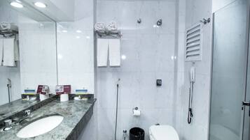 Luxury Single Room, 1 Bedroom | Bathroom | Shower, hair dryer, towels, soap