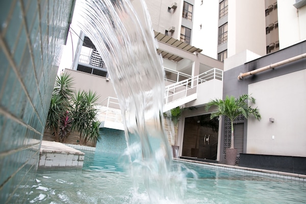 Outdoor pool, open 6:00 AM to 10:00 PM, sun loungers