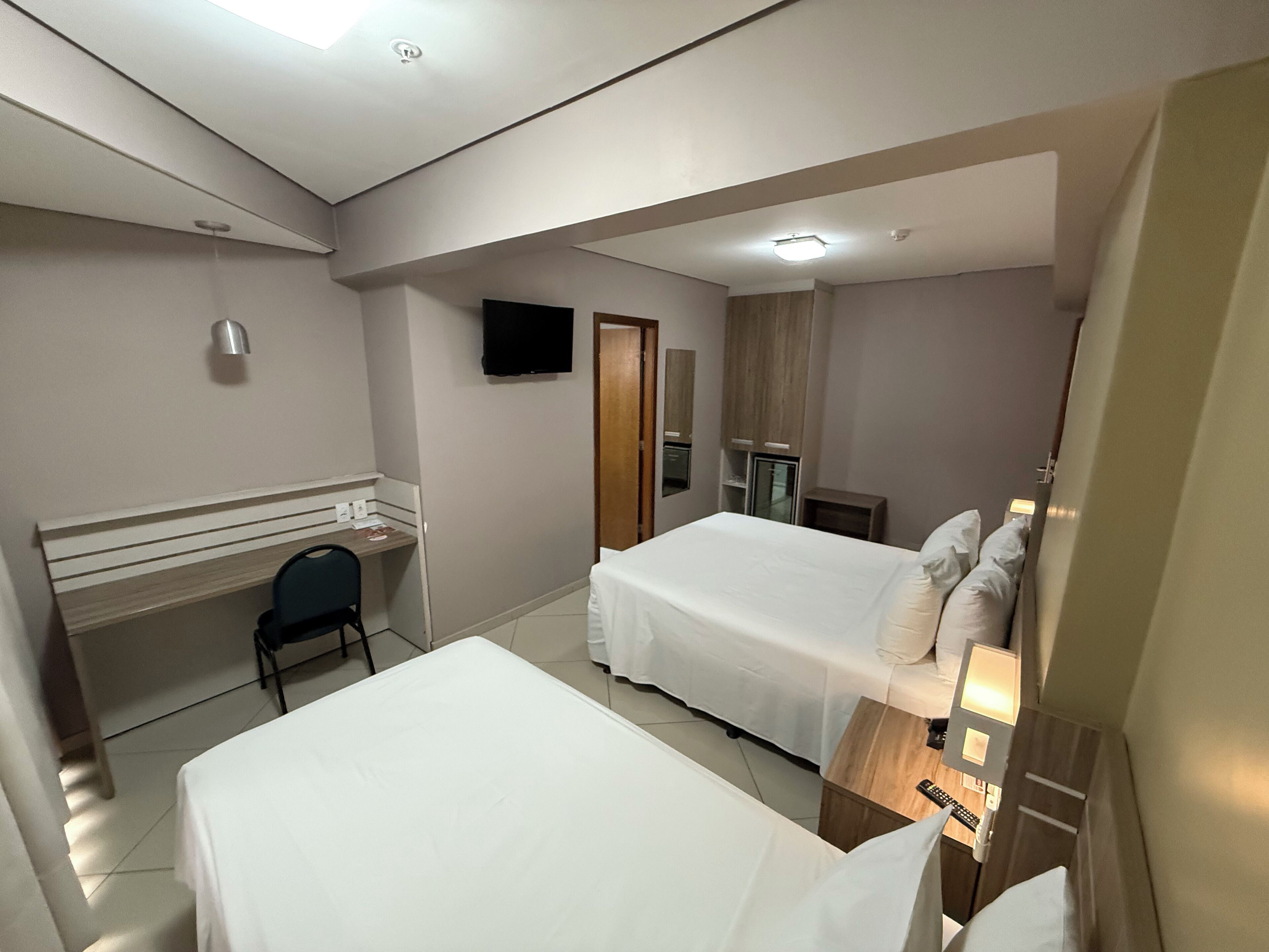 economy triple room, 1 bedroom | 1 bedroom, minibar, in-room safe, desk