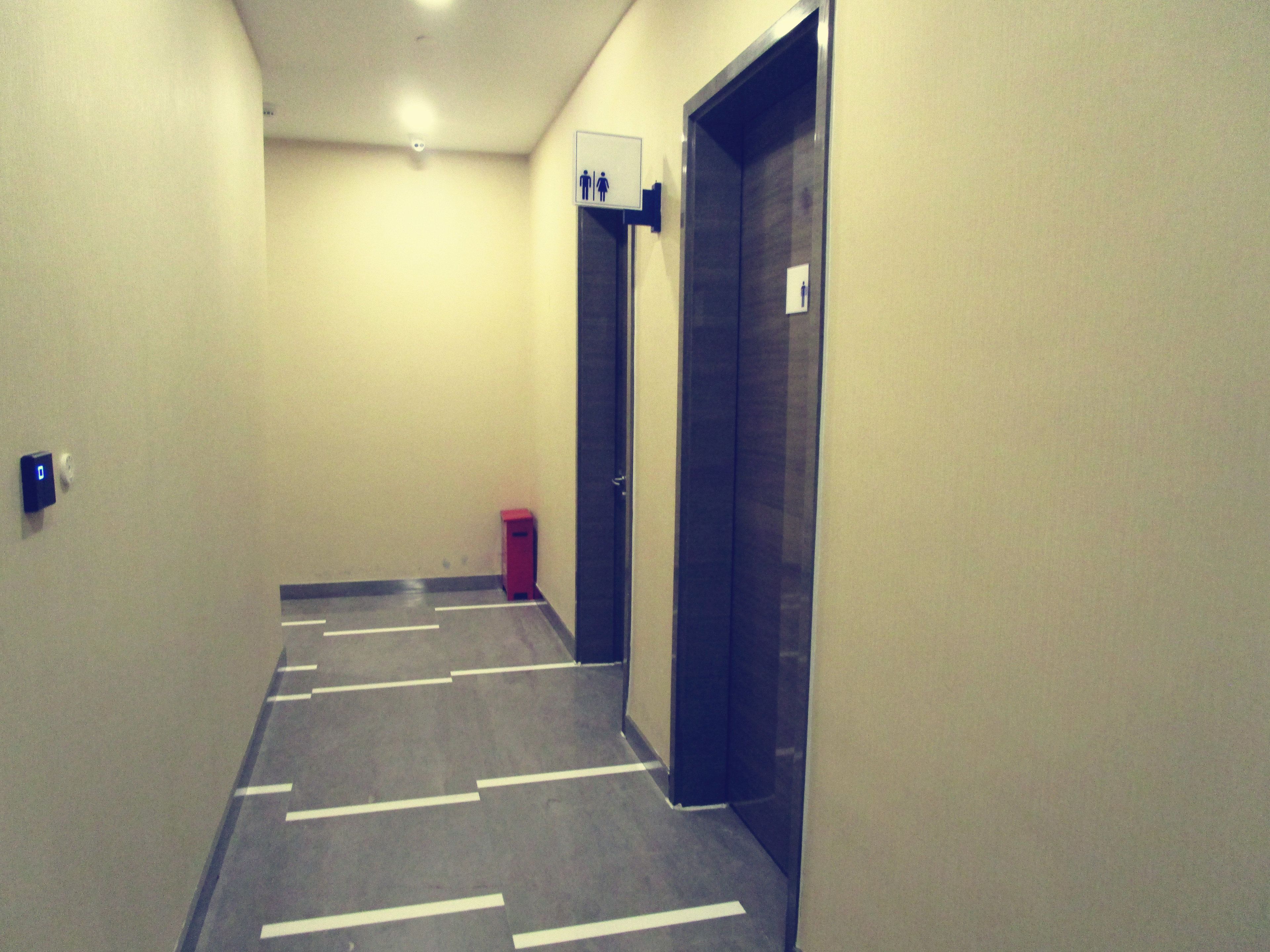 shower, hair dryer, slippers, towels