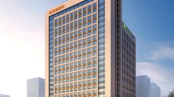 Experience the comfort of a hotel room with a view of the city.