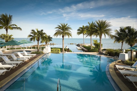 2 outdoor pools, cabanas (surcharge), pool umbrellas. Courtyard by Marriott Faro Blanco Resort, Marathon Florida Keys