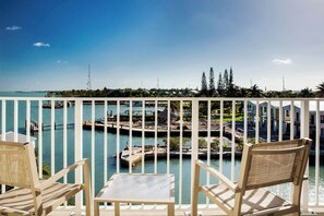 In-room safe, desk, laptop workspace, blackout curtains - Courtyard by Marriott Faro Blanco Resort, Marathon Florida Keys (Marathon)
