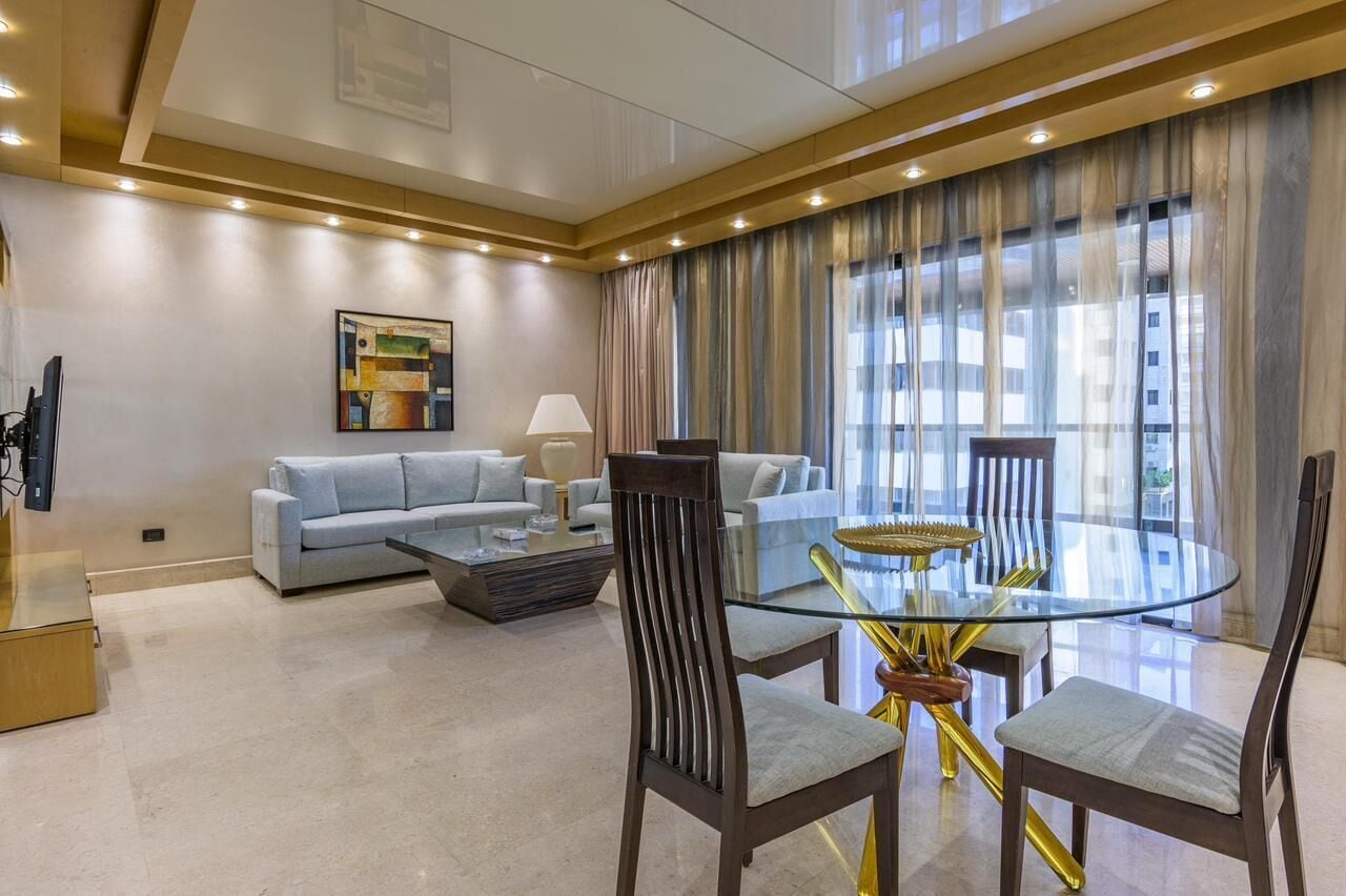 family suite, 2 bedrooms, smoking, kitchenette | living area | lcd tv