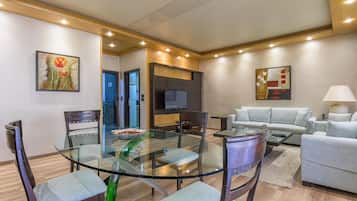 Family Suite, 2 Bedrooms, Smoking, Kitchenette | Living area | LCD TV