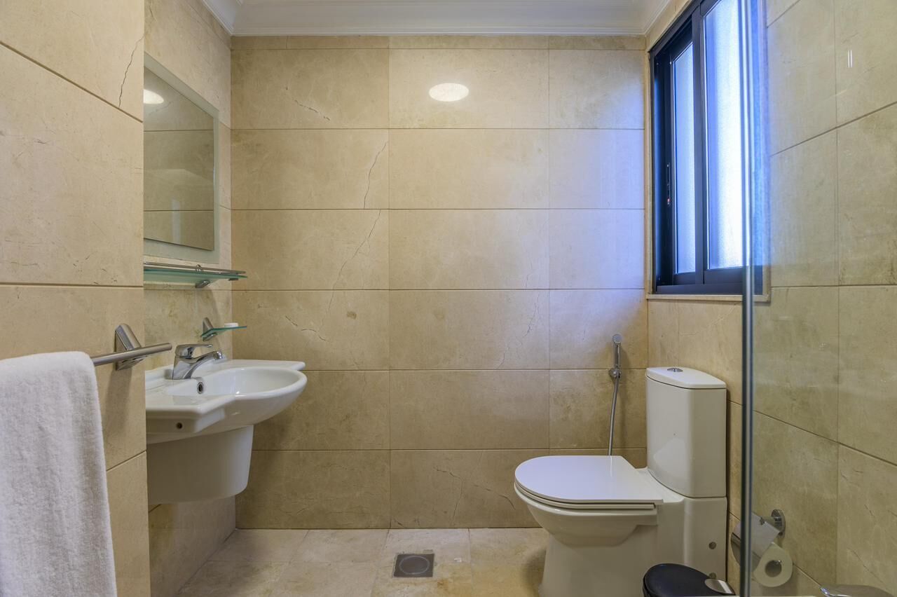 family suite, 2 bedrooms, smoking, kitchenette | bathroom | free toiletries, hair dryer, bathrobes, bidet