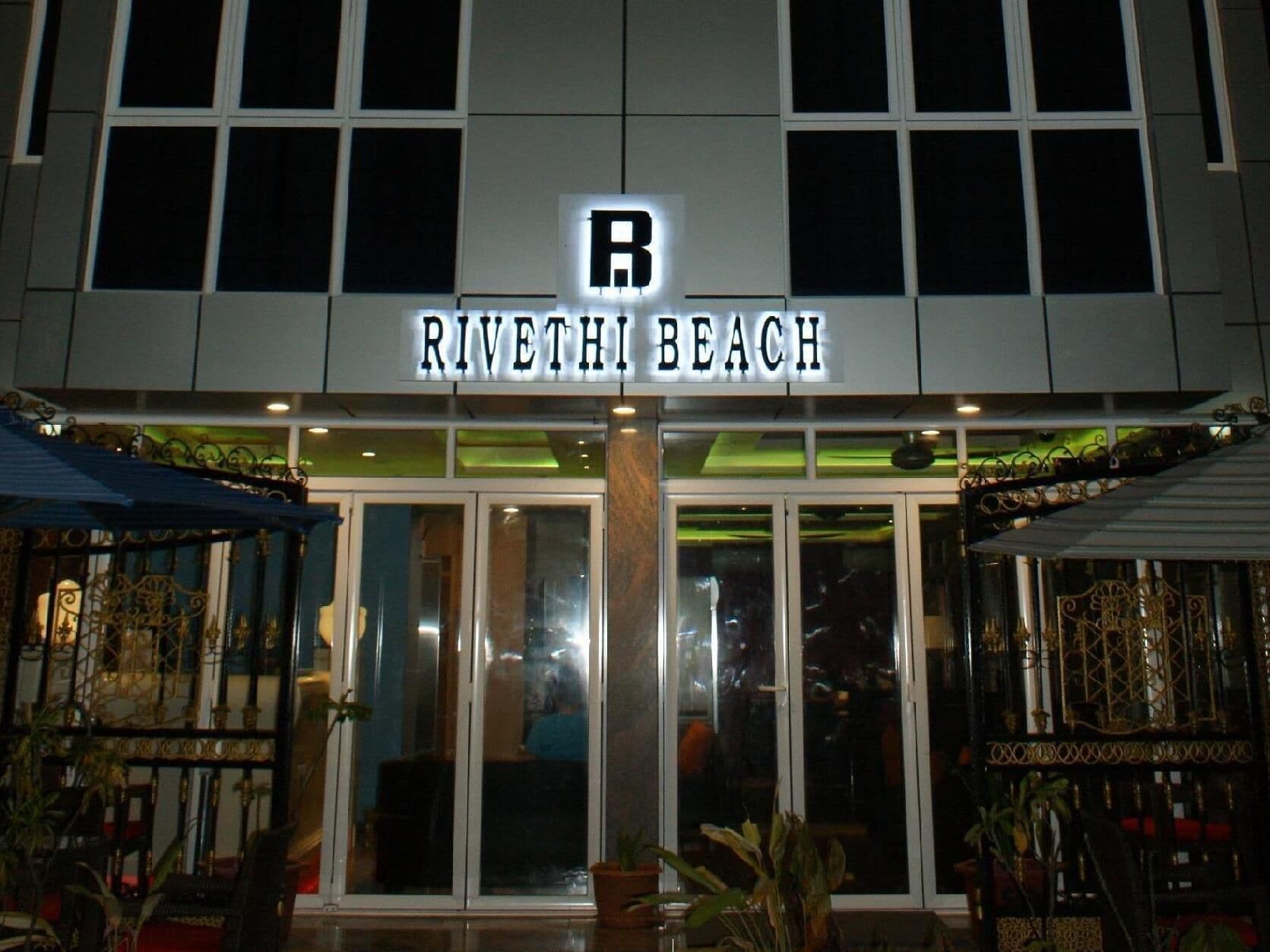 The exterior of Riveth Beach with a prominent sign above the entrance.