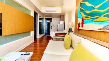 Suite, 1 Bedroom (Bed type subject to availability) | Living area | Flat-screen TV, DVD player
