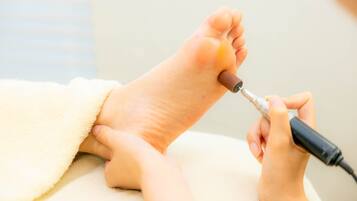 A foot being treated with a medical device.
