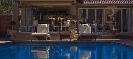 Outdoor pool, pool umbrellas, pool loungers