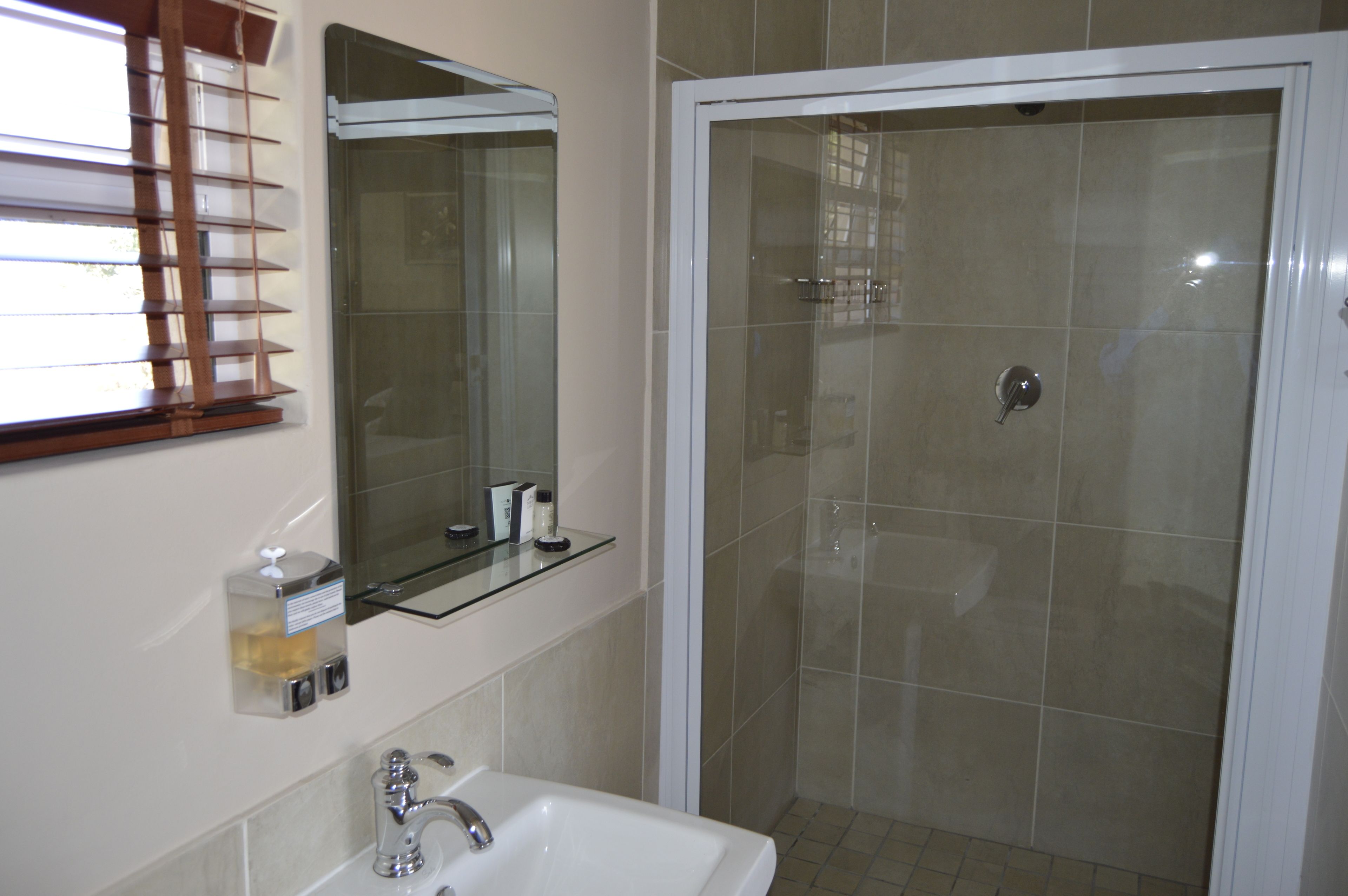 shower, rainfall showerhead, designer toiletries, hair dryer