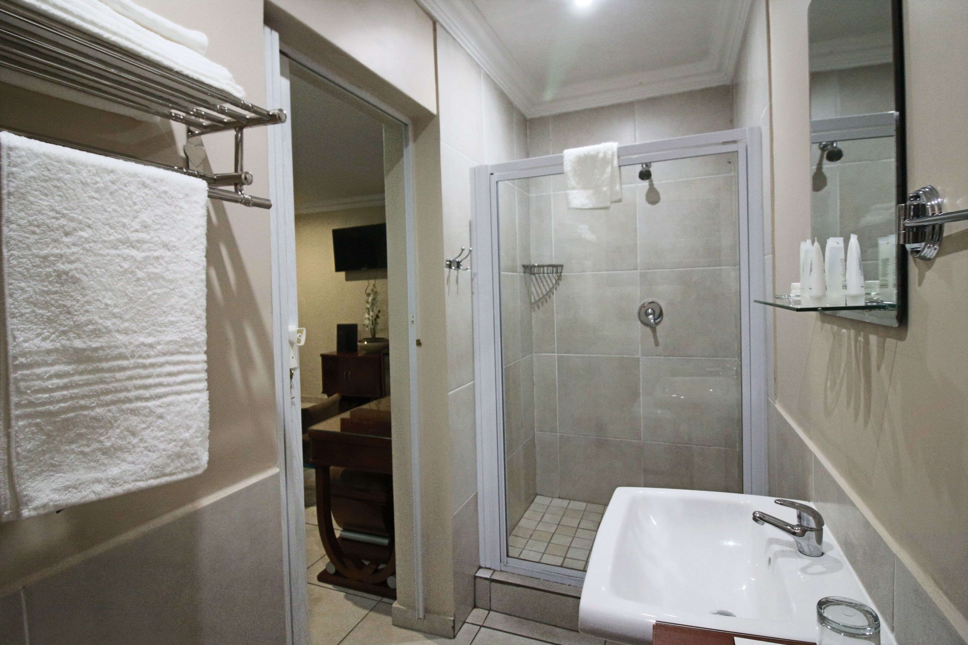 shower, rainfall showerhead, designer toiletries, hair dryer