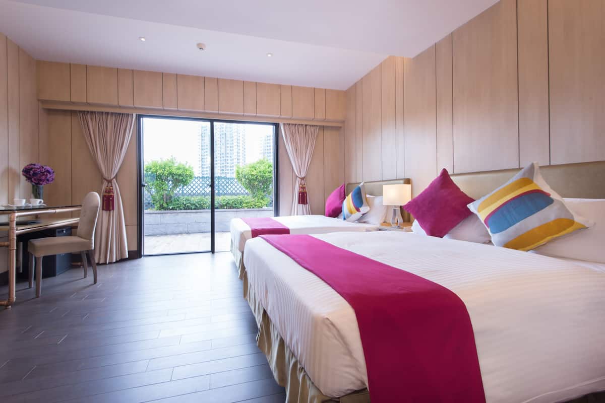 Grand kamer, 2 queensize bedden | Verduisterende gordijnen, een strijkplank/strijkijzer, gratis wifi