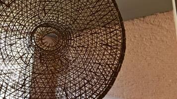 A circular, geometric-patterned ceiling structure.