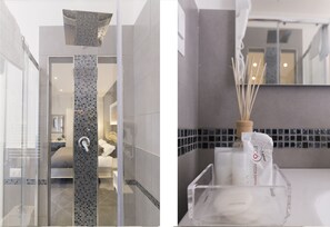 Superior tweepersoonskamer | Badkamer | Gratis toiletartikelen, een haardroger, handdoeken, shampoo