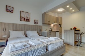 Deluxe Apartment, 1 Bedroom, Terrace, City View | In-room safe, desk, soundproofing, iron/ironing board