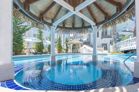 Indoor pool, 6 outdoor pools, pool umbrellas
