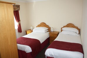 Economy Double or Twin Room | Iron/ironing board, free cribs/infant beds