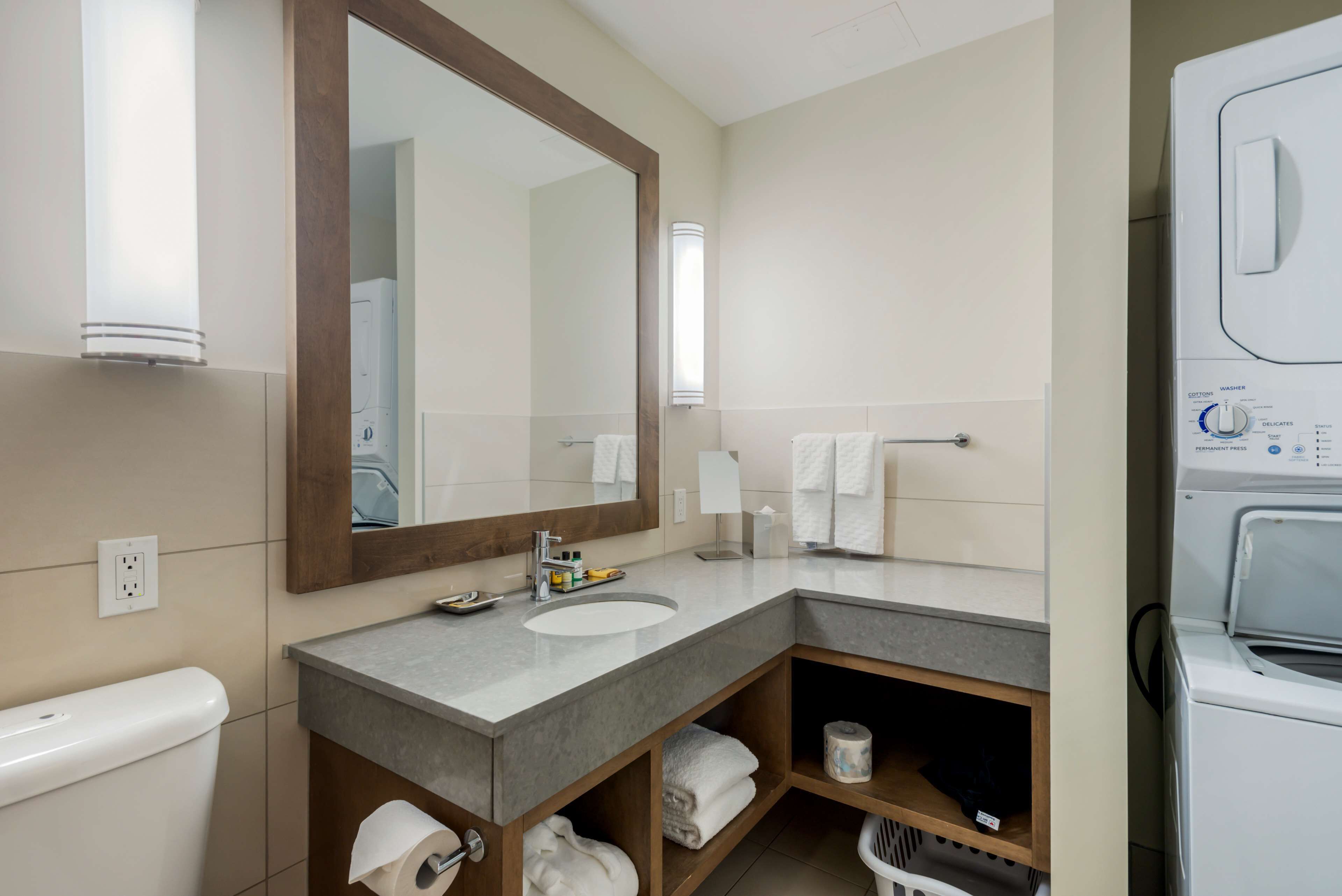 suite, 1 king bed, non smoking, kitchenette (shower only) | bathroom | shower, free toiletries, hair dryer, bathrobes