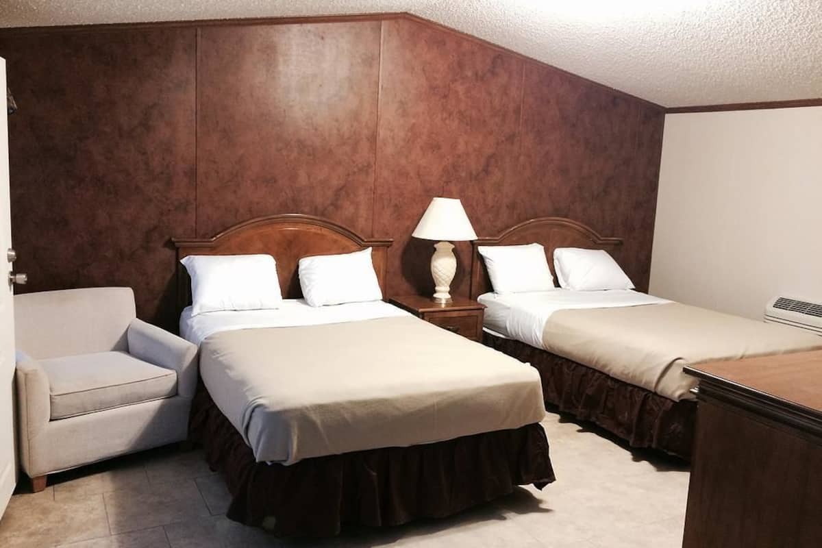 Deluxe suite, 2 tweepersoonsbedden | Luxe beddengoed, een bureau, gratis wifi, beddengoed