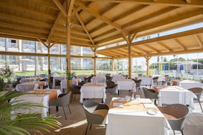 Lunch, dinner served; Mediterranean cuisine, pool views