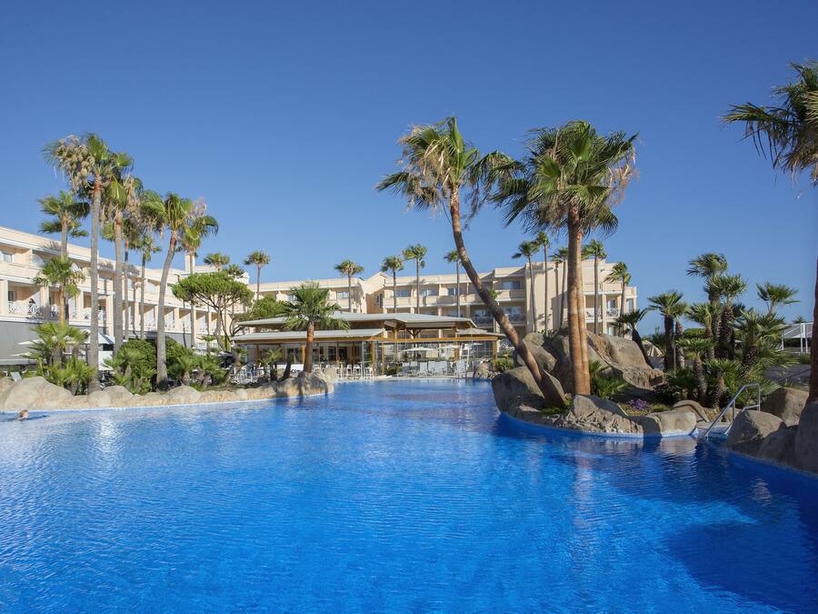 Indoor pool, outdoor pool, pool umbrellas, pool loungers