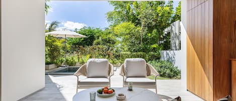 Departamento Deluxe, varias camas | Terraza o patio